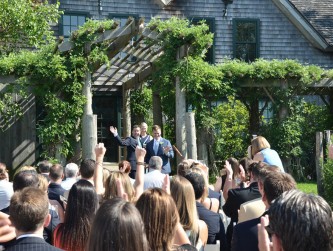 Guests standing and clapping after the ceremony, Vivid Visions photo